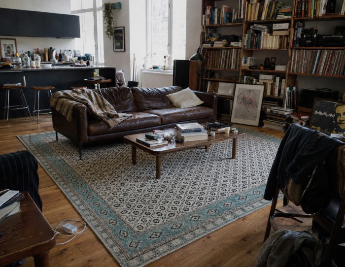blue carpet for brown leather sofa